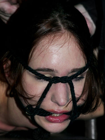 Tied Up Calico Slave In Gag Mask Made Of Black Ropes Gets Her Snatch Vibrated.