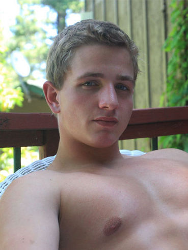 Topless Muscle Guy Marcus Mojo In White Shorts Reads The Porn Magazine Outdoors
