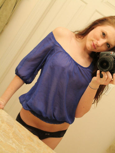 Freckles Takes Photos Of Herself In The Mirror And We See Her Boobs Through Her Shirt