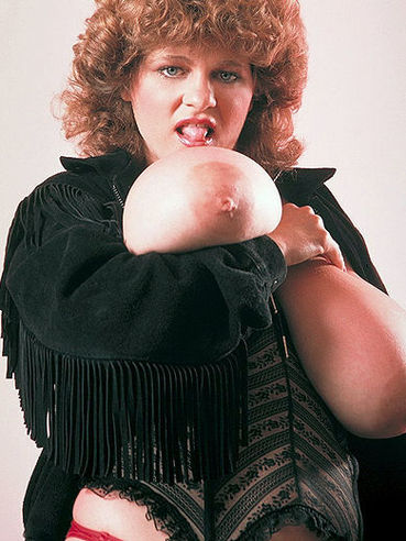Curly Haired Thick Redhead Darlene Lupone Dressed In Black Displays Her Gigantic Tits