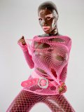 Bianca Beauchamp Poses In Skin Tight Latex Body Suit And Pink Fishnet Outfit